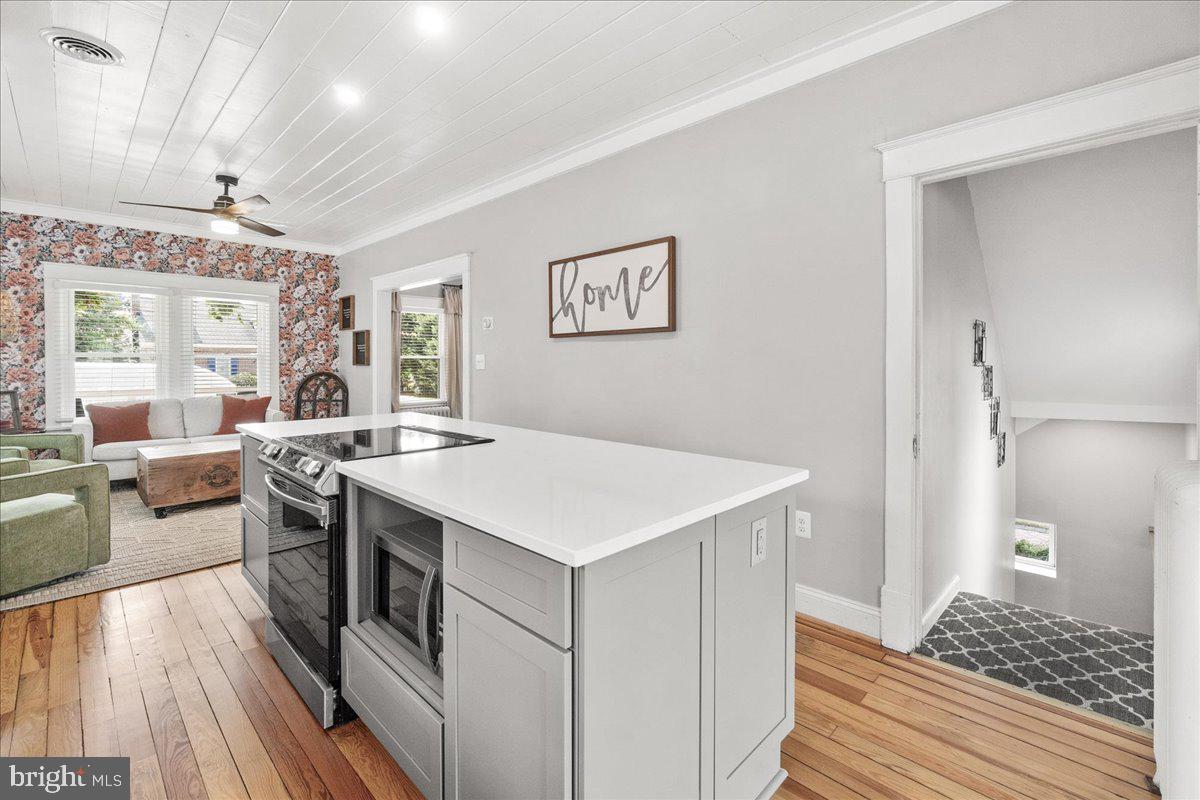 403 Wilson Place Frederick, MD 21702 - Photo 14 of 63 a view of a kitchen from the living room