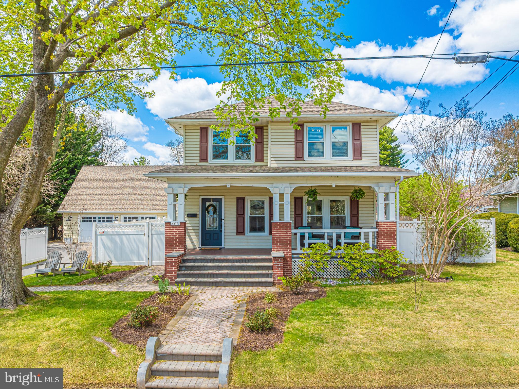 403 Wilson Place Frederick, MD 21702 - Photo 2 of 63 a front view of a house with a garden