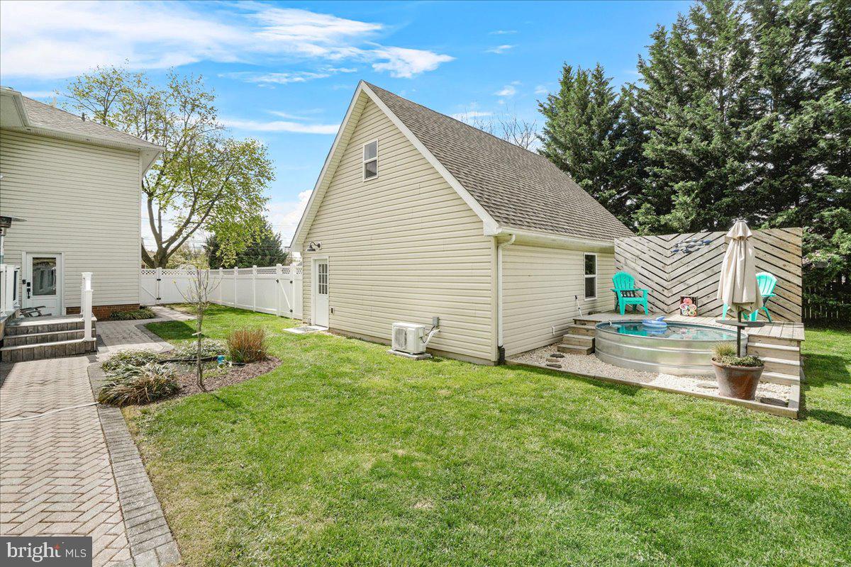 403 Wilson Place Frederick, MD 21702 - Photo 39 of 63 a view of backyard with a garden and entertaining space