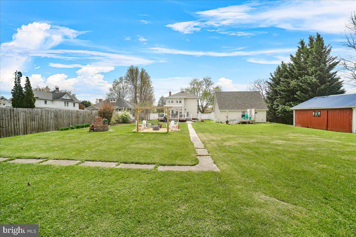 403 Wilson Place Frederick, MD 21702 - Photo 48 of 63 a view of a big yard with a house