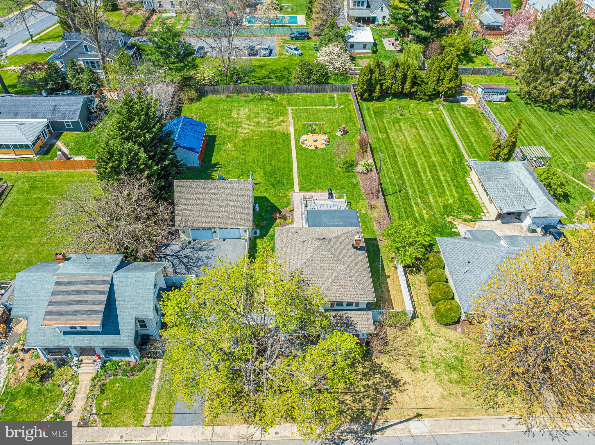 403 Wilson Place Frederick, MD 21702 - Photo 55 of 63 an aerial view of a house with a yard basket ball court and outdoor seating