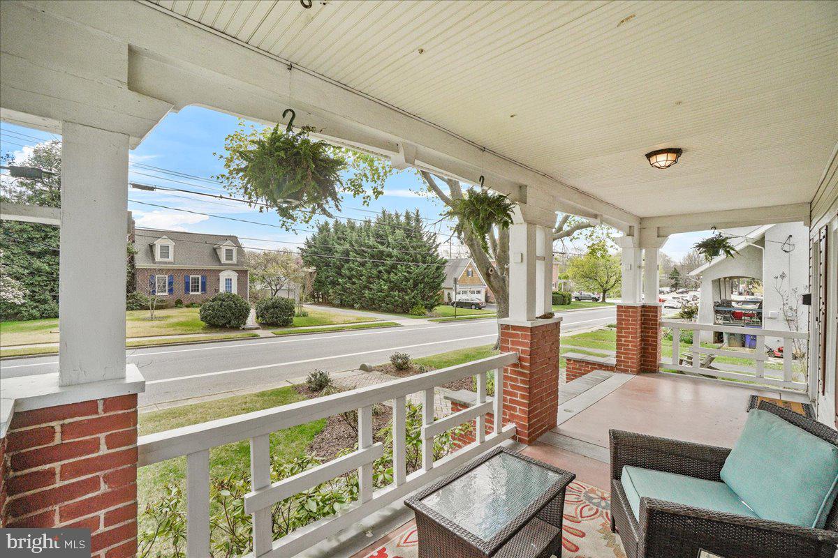 403 Wilson Place Frederick, MD 21702 - Photo 6 of 63 a view of an chairs and table in the balcony
