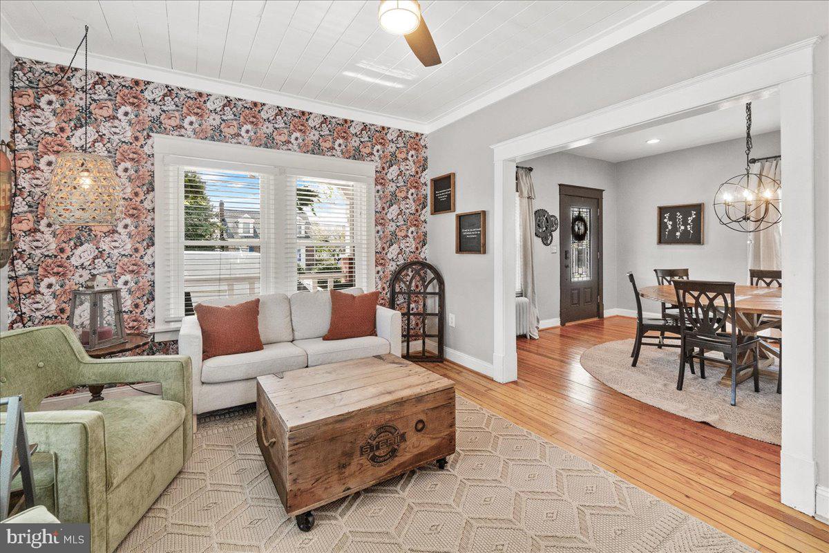 403 Wilson Place Frederick, MD 21702 - Photo 10 of 63 a living room with furniture and wooden floor