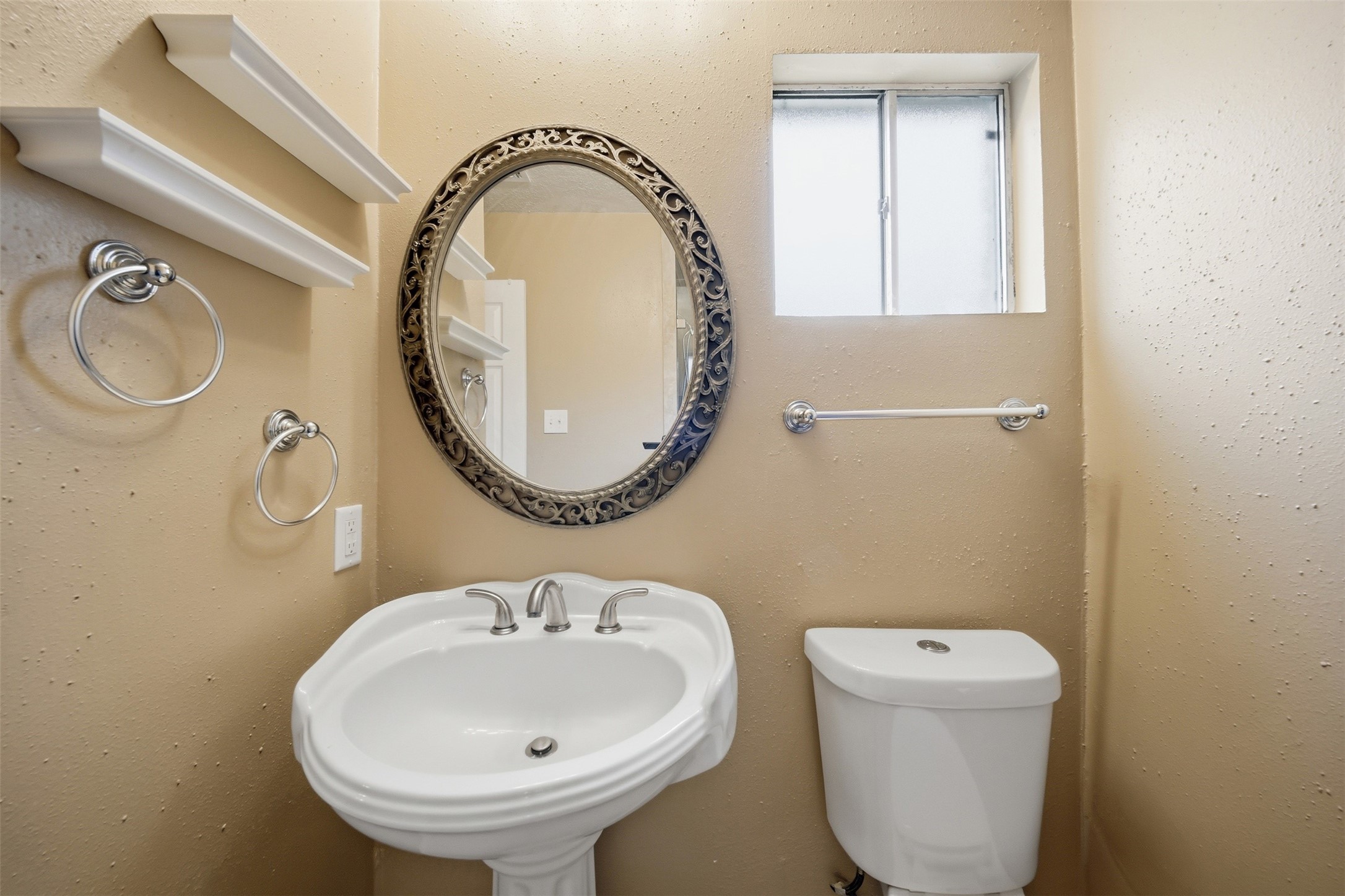 9418 Kilrenny Drive Spring, TX 77379 - Photo 30 of 47 a bathroom with a sink and a mirror