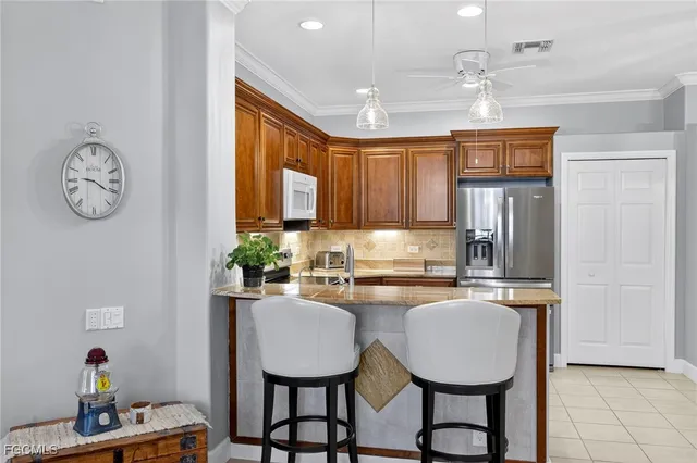 a kitchen with sink cabinets and window