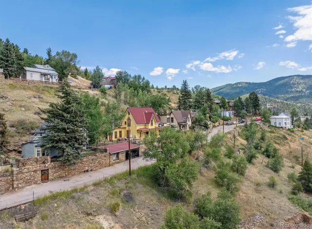 a view of a town with trees around