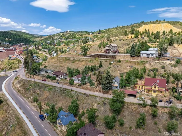 a view of a city with a lake