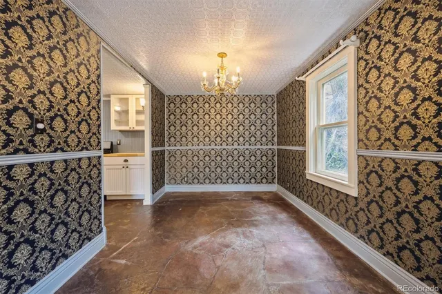 a view of front door with wooden floor