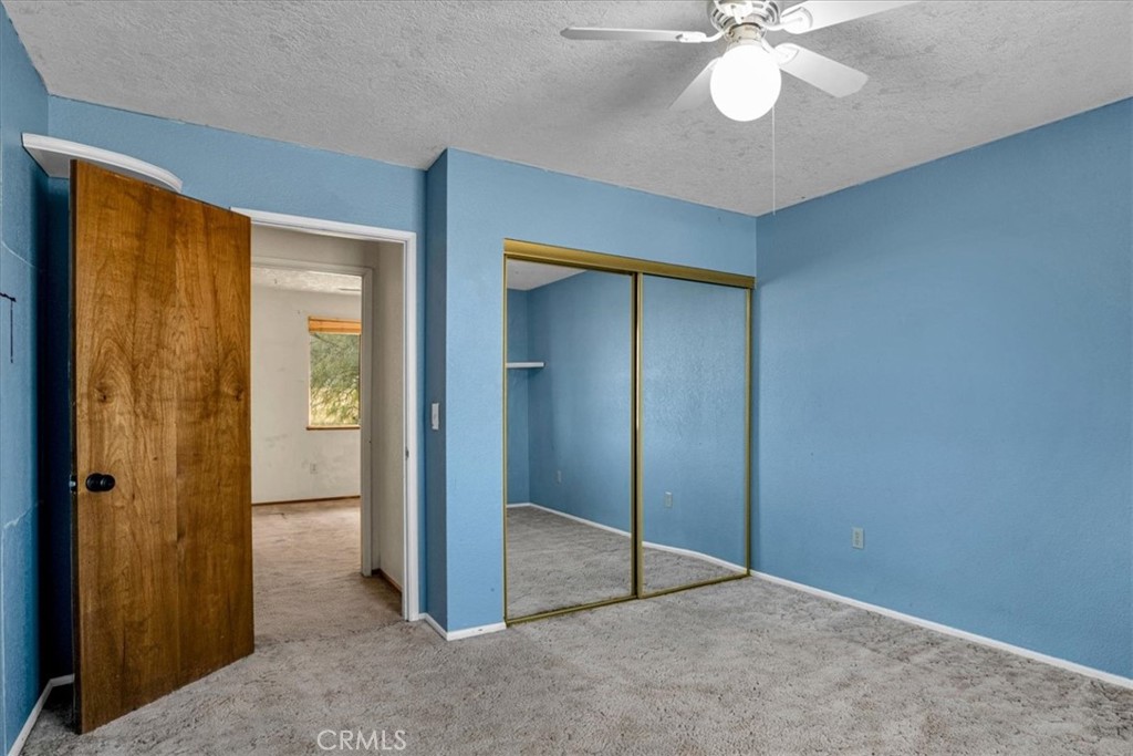 72775 2 Mile Road Twentynine Palms, CA 92277 - Photo 18 of 55 wooden floor in an empty room with a bathroom