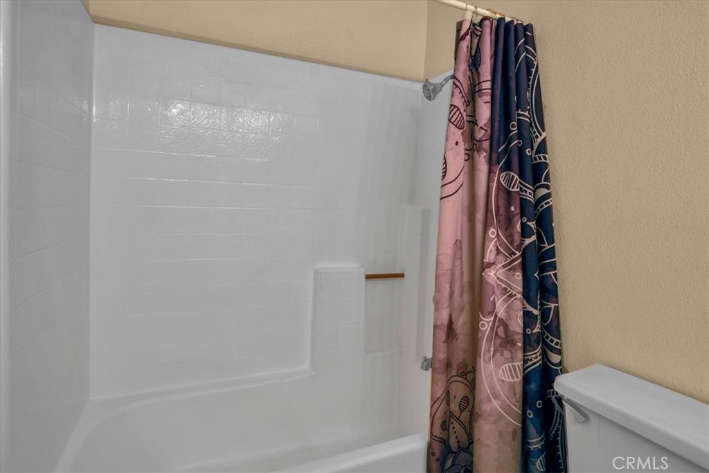72775 2 Mile Road Twentynine Palms, CA 92277 - Photo 20 of 55 a bathroom with a shower curtain