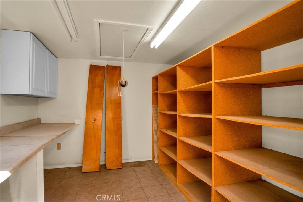 72775 2 Mile Road Twentynine Palms, CA 92277 - Photo 39 of 55 a view of walk in closet with empty racks