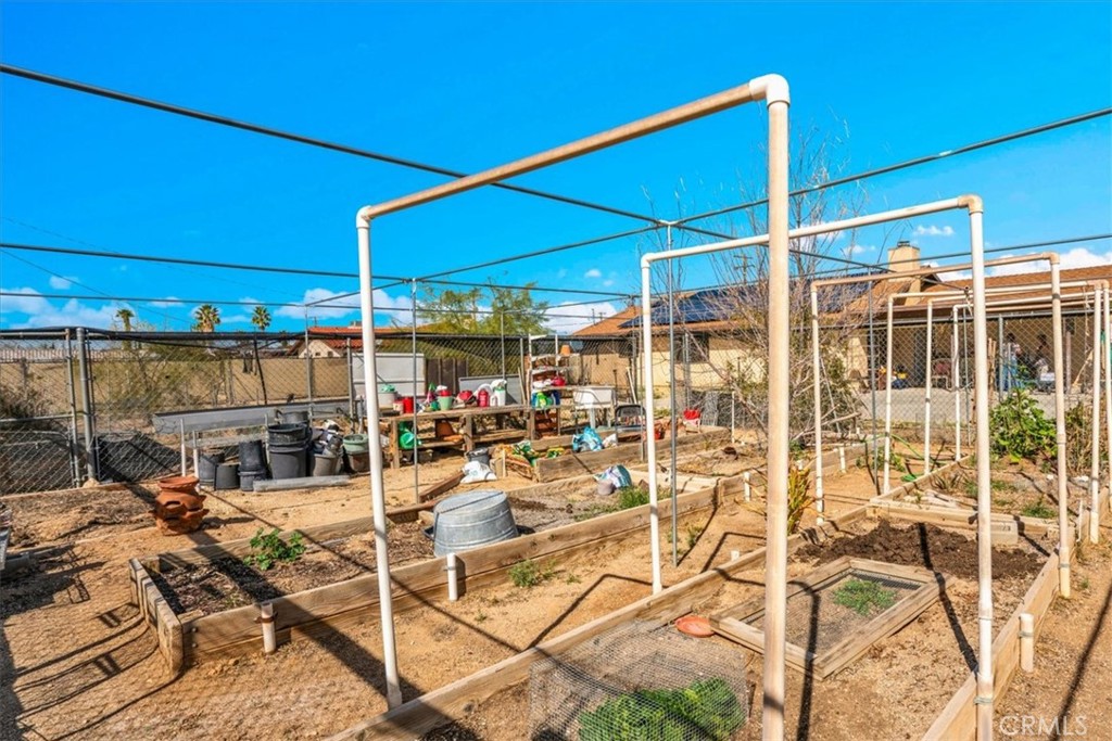 72775 2 Mile Road Twentynine Palms, CA 92277 - Photo 42 of 55 a view of a patio with a table and chairs