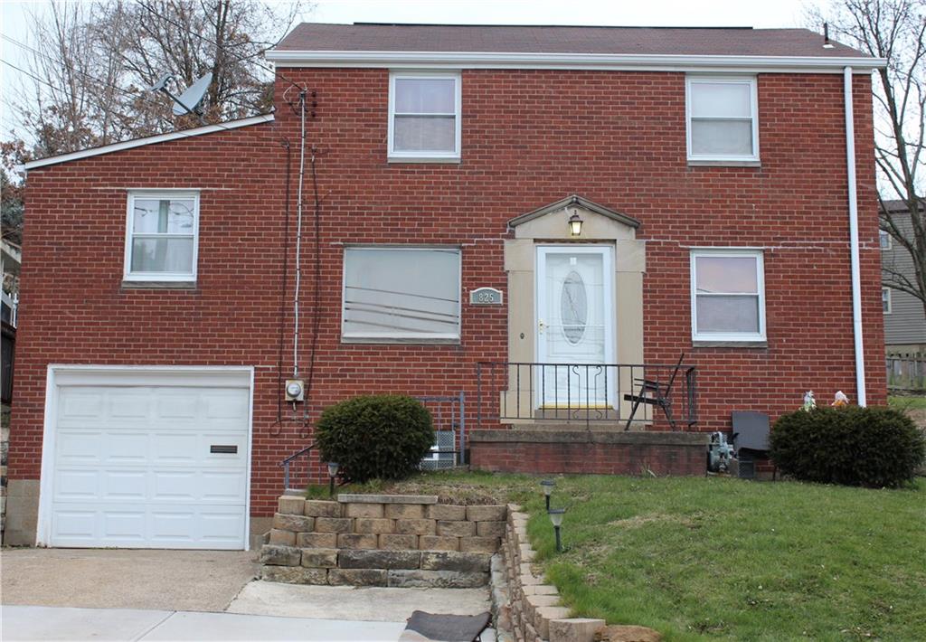 825 Geyer Road Pittsburgh, PA 15212 - Photo 1 of 20 a front view of a house with garden