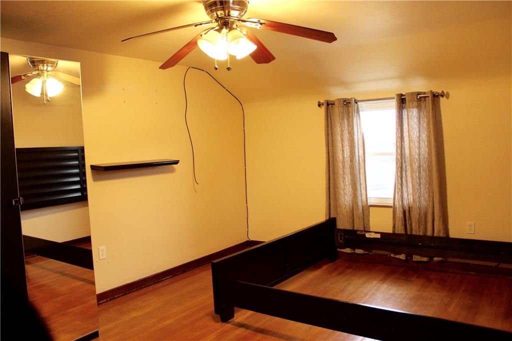 825 Geyer Road Pittsburgh, PA 15212 - Photo 11 of 20 a room with a bed and a window