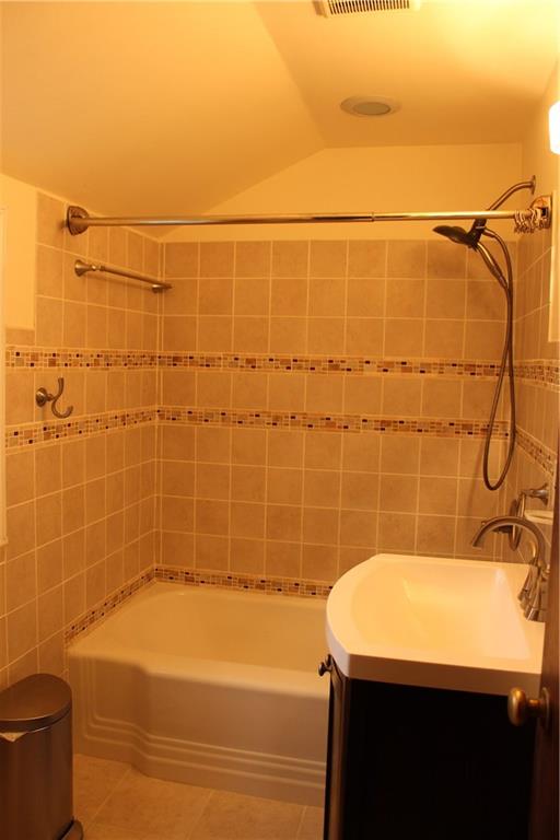 825 Geyer Road Pittsburgh, PA 15212 - Photo 14 of 20 a bathroom with a bathtub and a shower