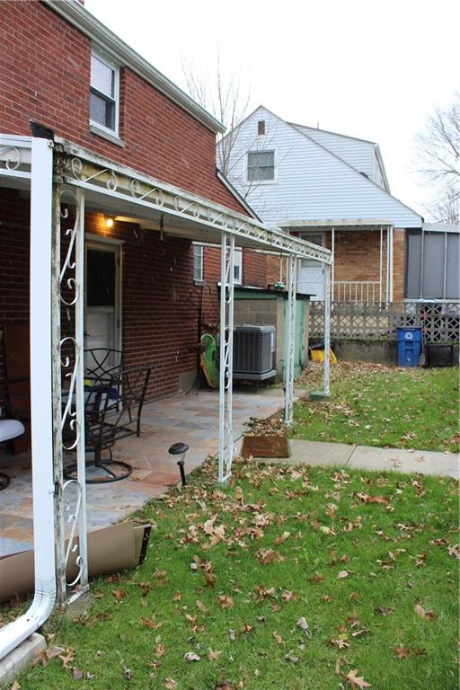 825 Geyer Road Pittsburgh, PA 15212 - Photo 19 of 20 a view of a house with backyard porch and sitting area