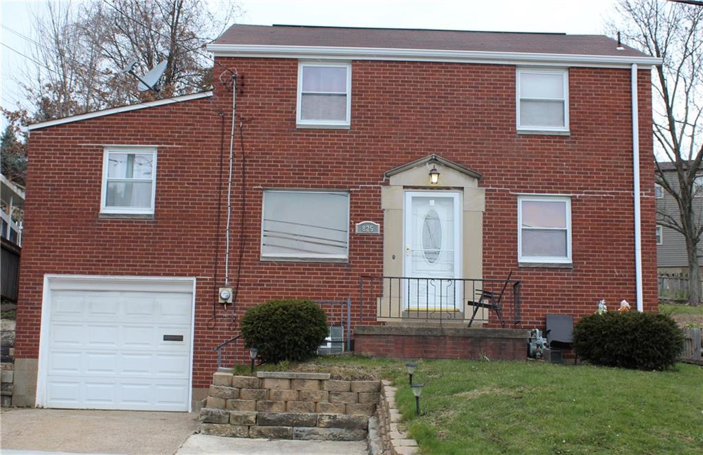 825 Geyer Road Pittsburgh, PA 15212 - Photo 2 of 20 a front view of a house with a yard
