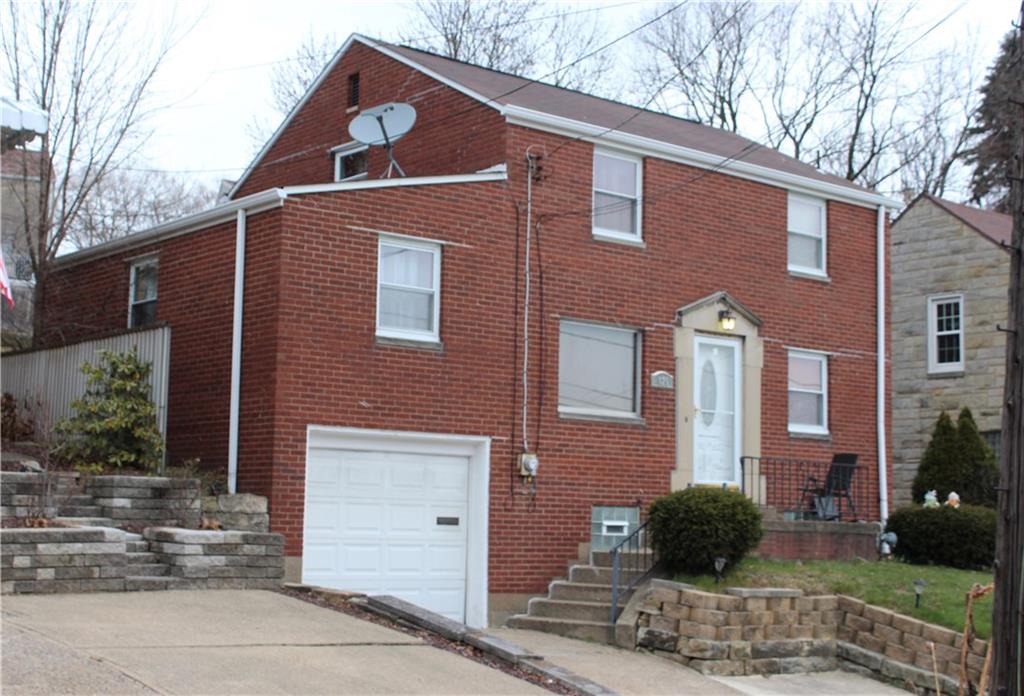 825 Geyer Road Pittsburgh, PA 15212 - Photo 3 of 20 a front view of a house with garden