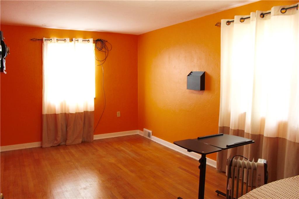 825 Geyer Road Pittsburgh, PA 15212 - Photo 8 of 20 a view of a room with wooden floor and small space
