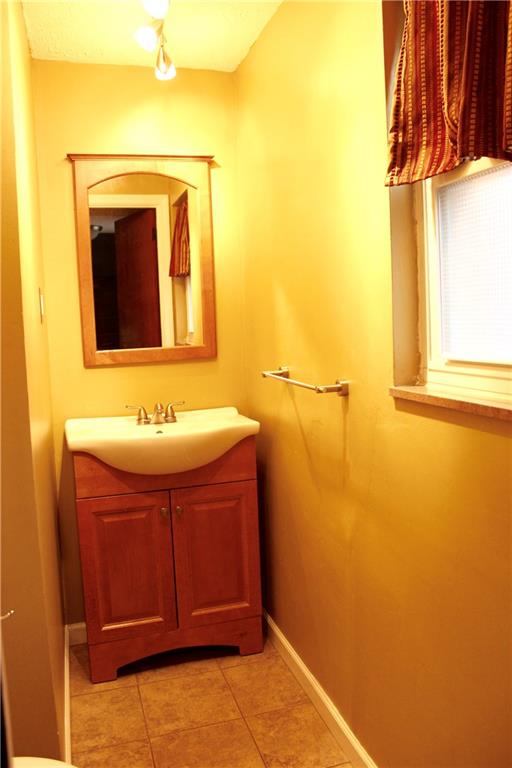 825 Geyer Road Pittsburgh, PA 15212 - Photo 9 of 20 a bathroom with a sink and a mirror