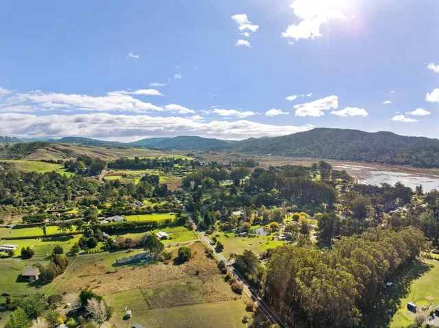 a view of a city with an ocean