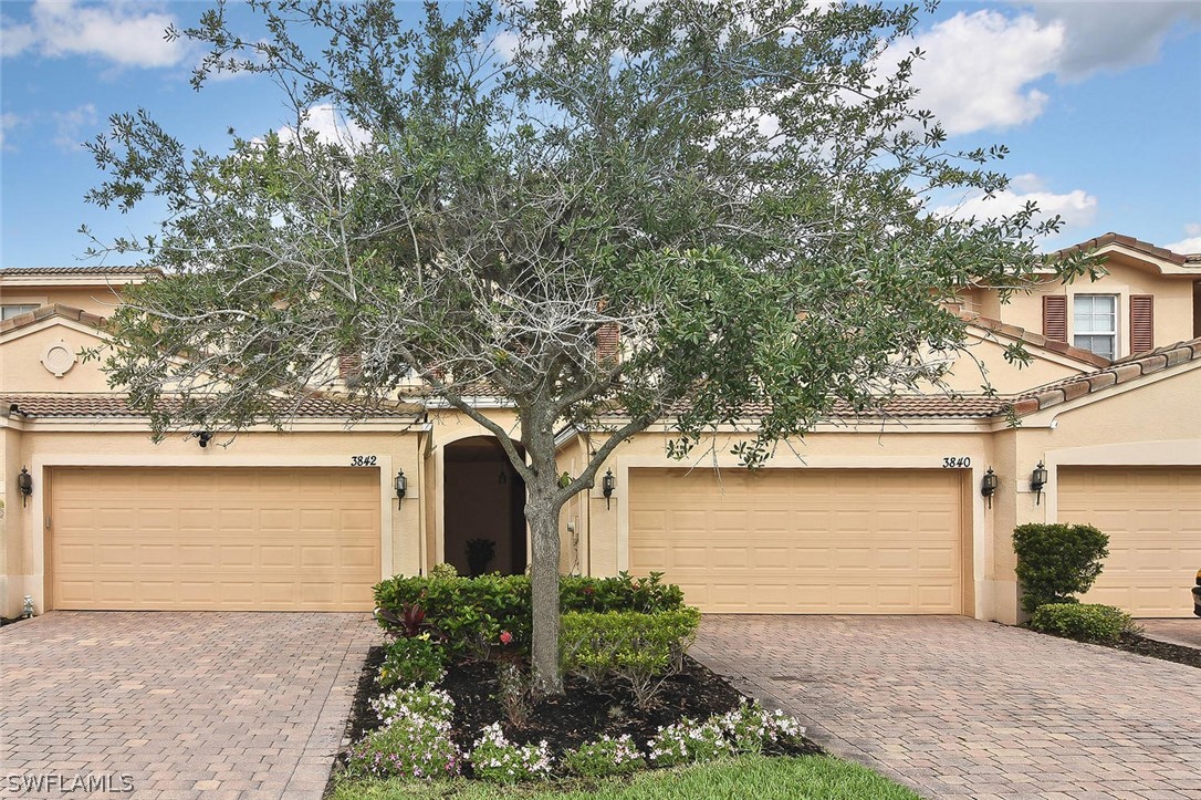3840 Cherrybrook Loop Fort Myers, FL 33966 - Photo 2 of 32 front view of a house with a street