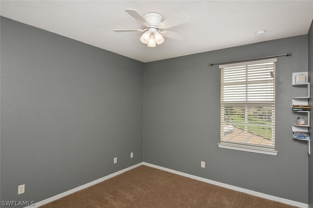 3840 Cherrybrook Loop Fort Myers, FL 33966 - Photo 21 of 32 a view of an empty room with a window
