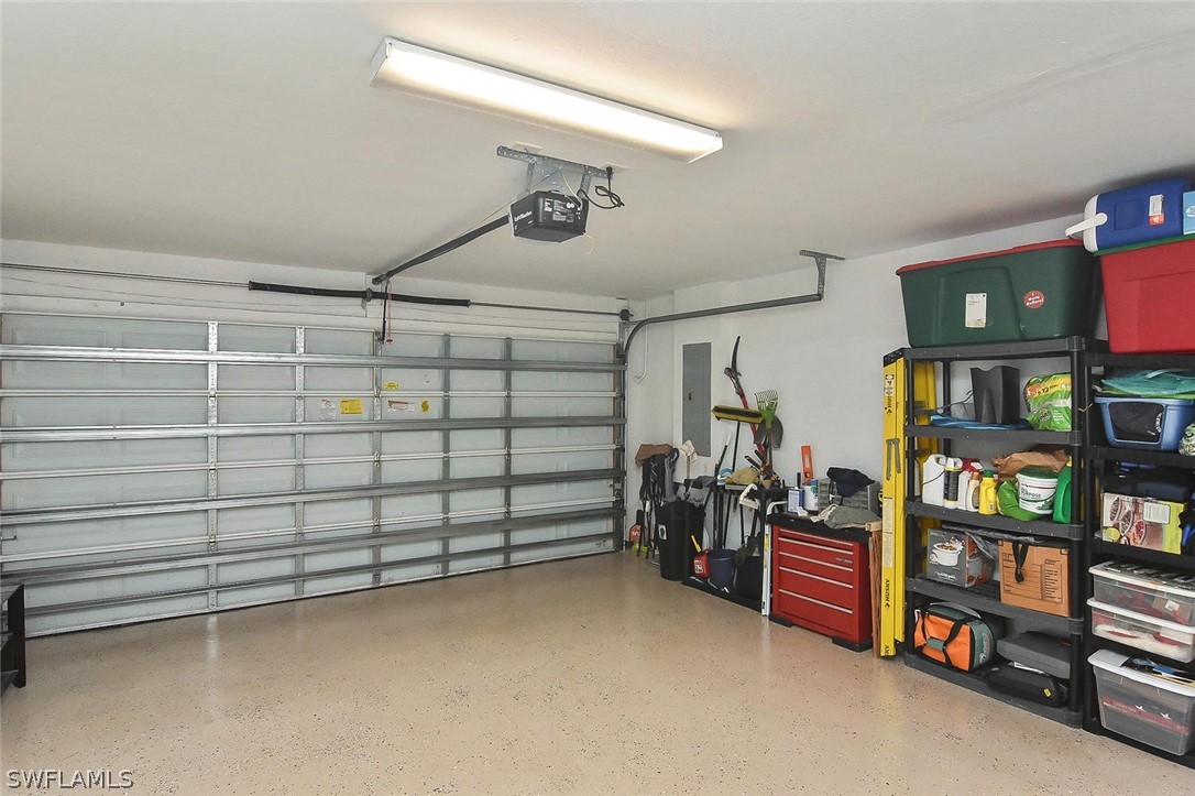 3840 Cherrybrook Loop Fort Myers, FL 33966 - Photo 25 of 32 a view of a room with racks on the wall
