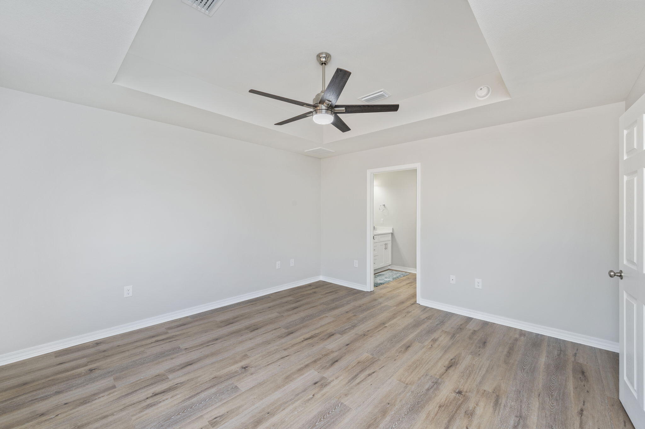 6200 Redeemer Way Crestview, FL 32539 - Photo 11 of 13 wooden floor in an empty room