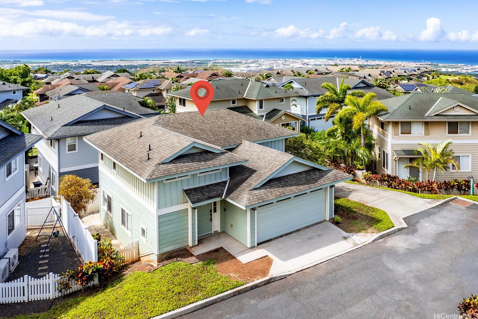 92-7049 Elele Street, Unit 22 Kapolei, HI 96707 - Photo 8 of 8 a view of residential houses with outdoor space