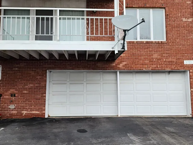 a front view of a house with a gate