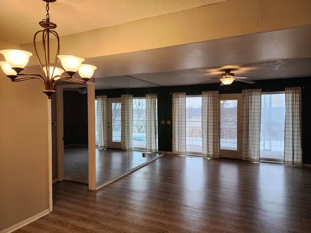 a view of a building stairs and a floor to ceiling window