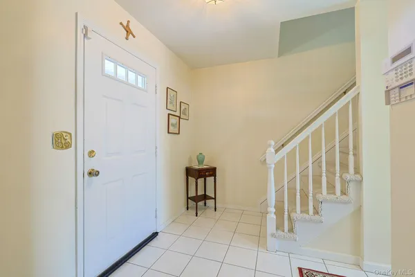 a view of front door with hallway