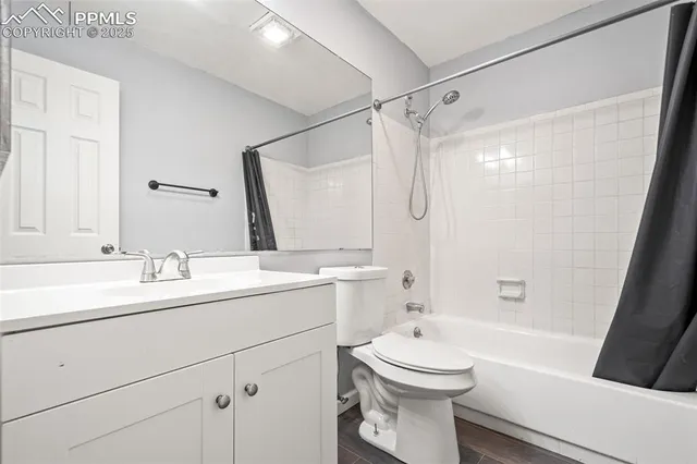 a bathroom with a sink a toilet and a bathtub