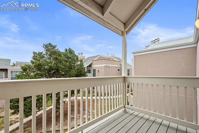 a view of a wooden fence