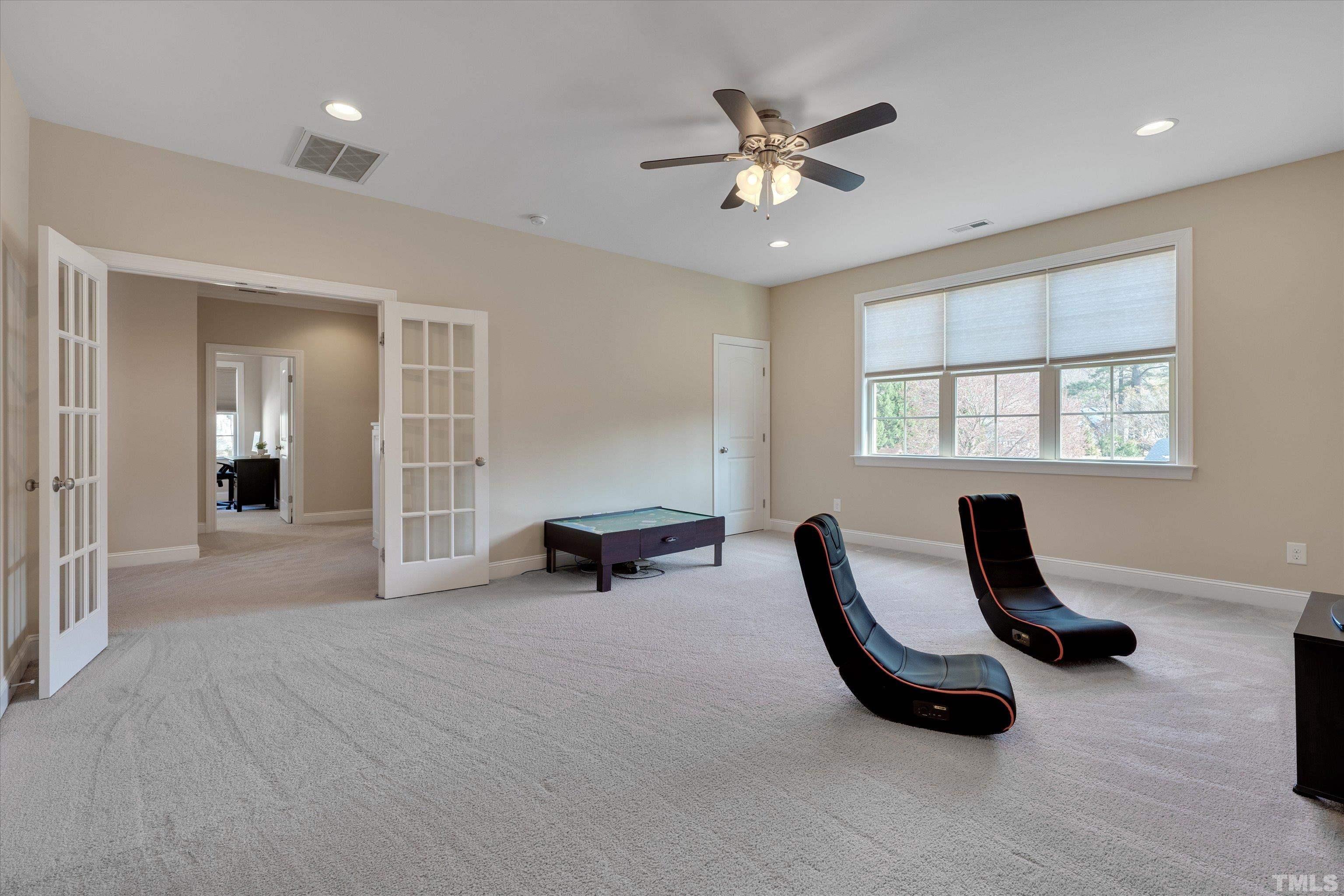 2704 Full Circle Raleigh, NC 27613 - Photo 18 of 32 a view of a livingroom with furniture and a window