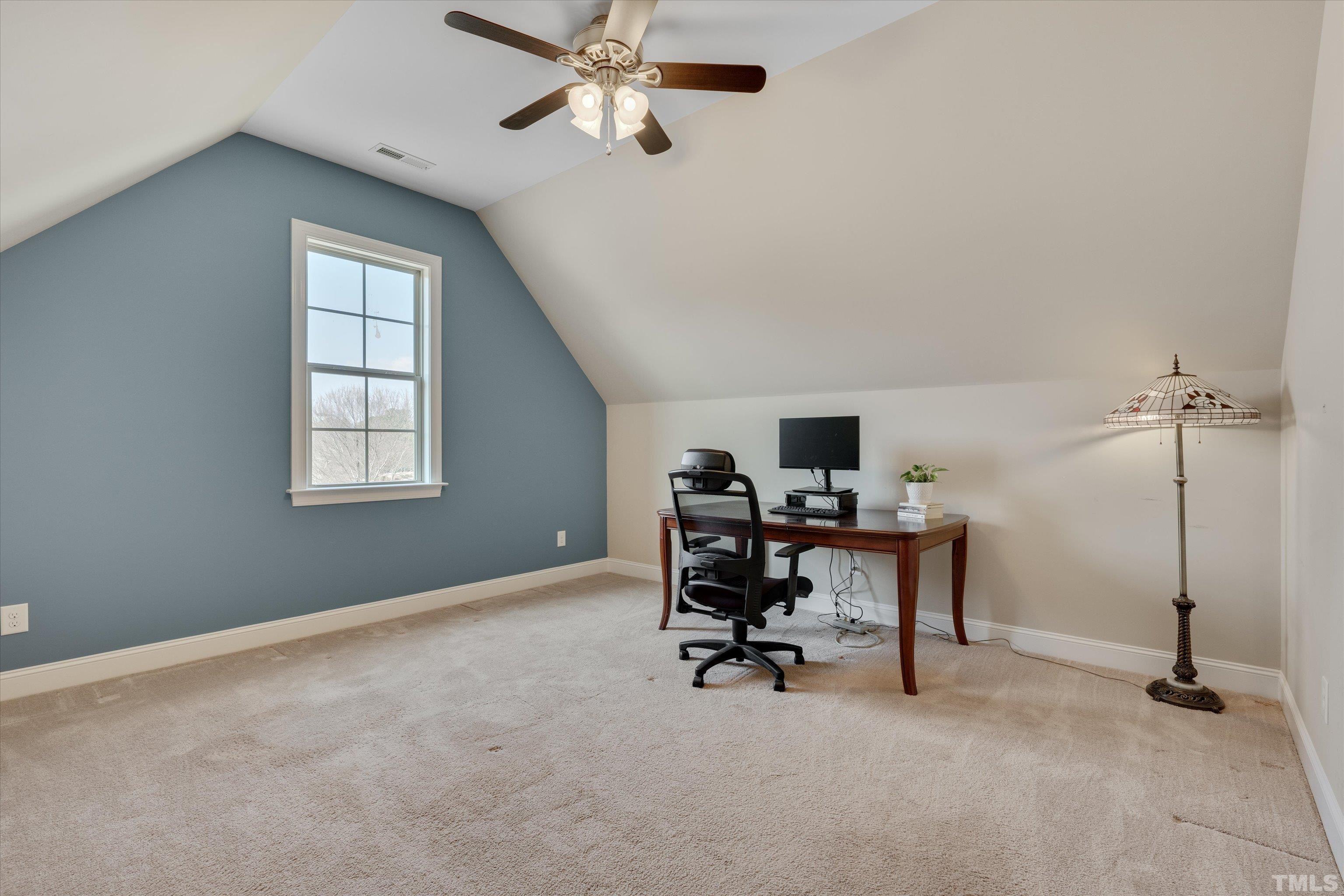2704 Full Circle Raleigh, NC 27613 - Photo 26 of 32 a view of a workspace with furniture and a window