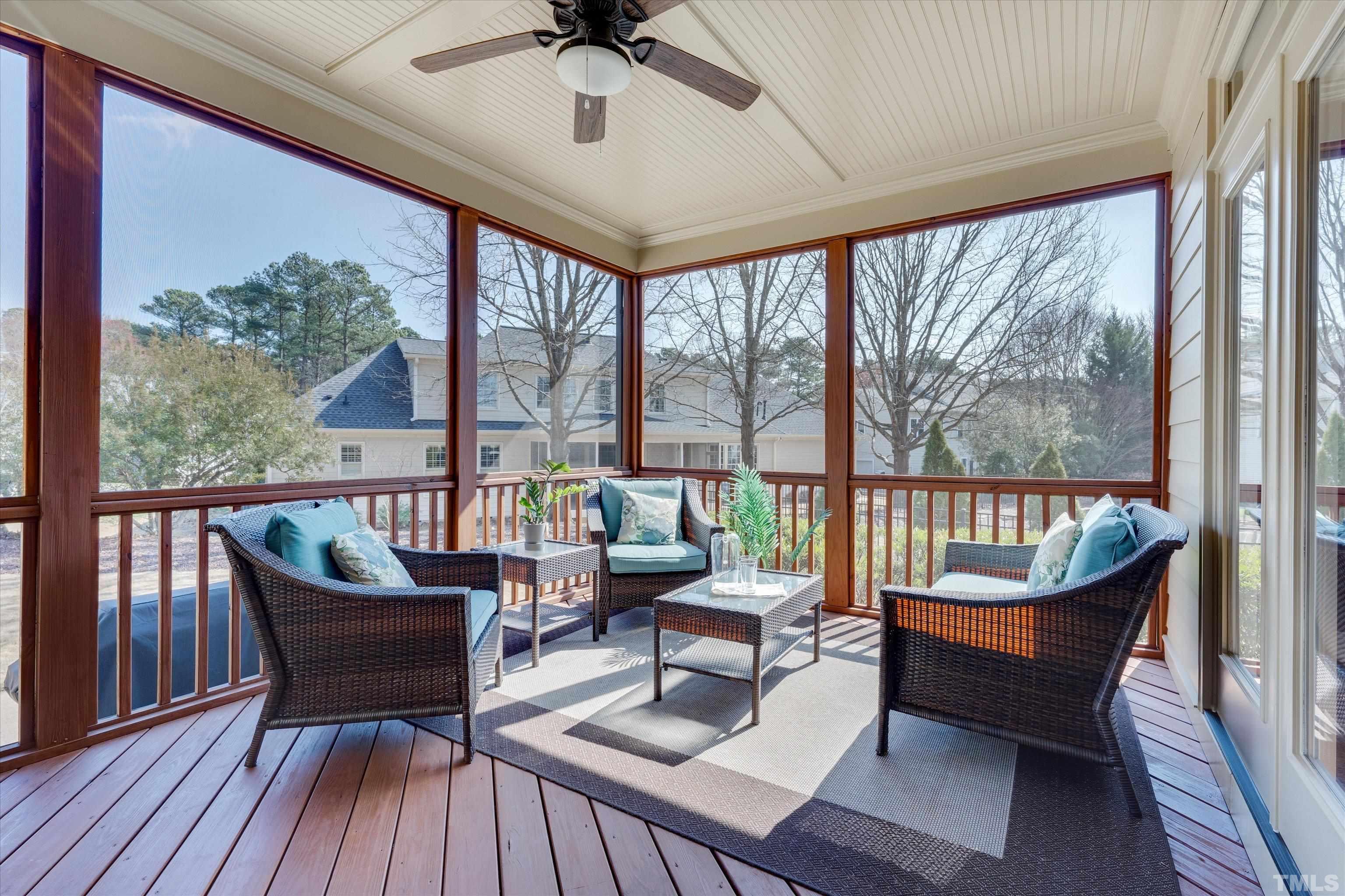 2704 Full Circle Raleigh, NC 27613 - Photo 30 of 32 a balcony with couch and wooden floor