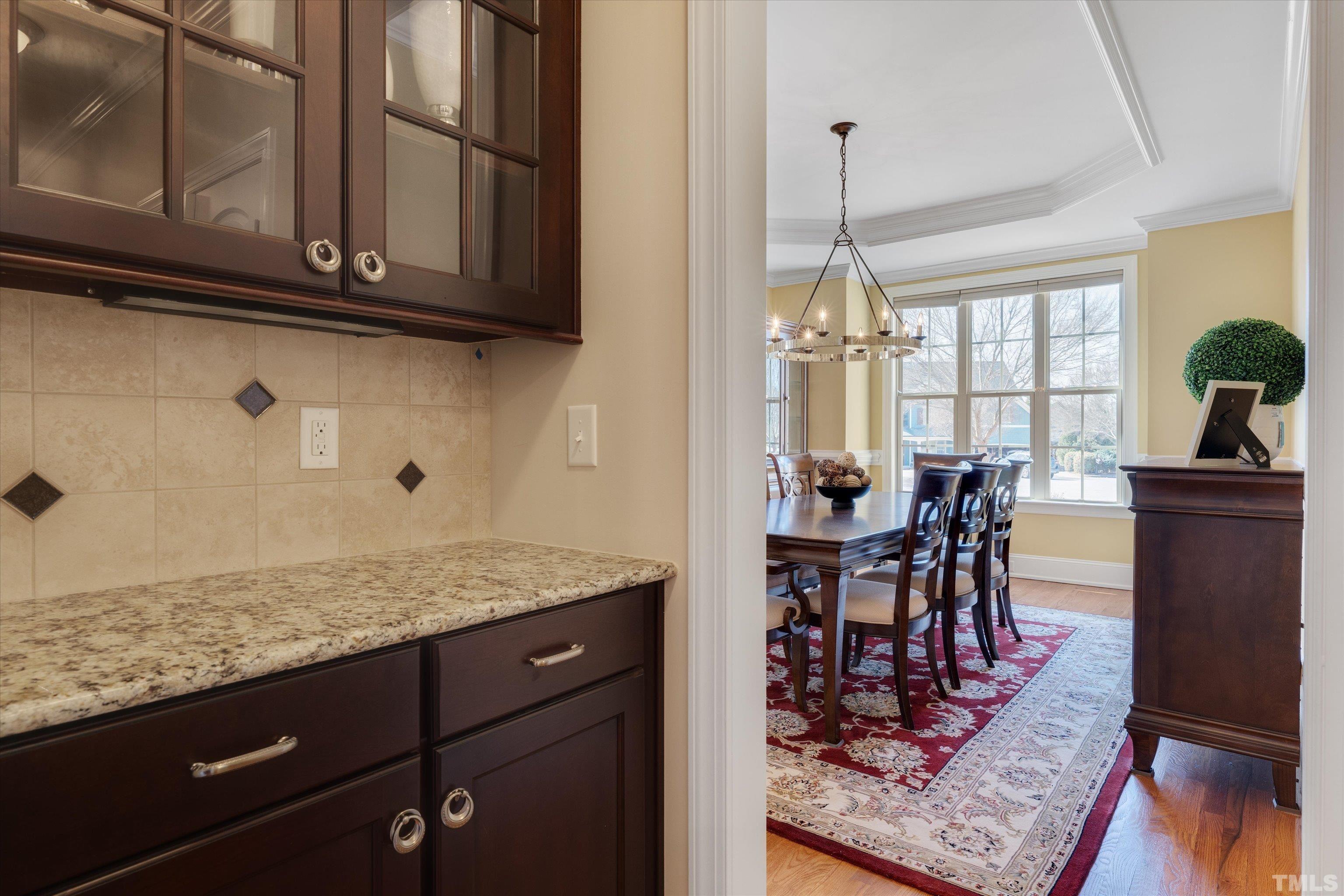 2704 Full Circle Raleigh, NC 27613 - Photo 5 of 32 a dining table chairs window and dining room view