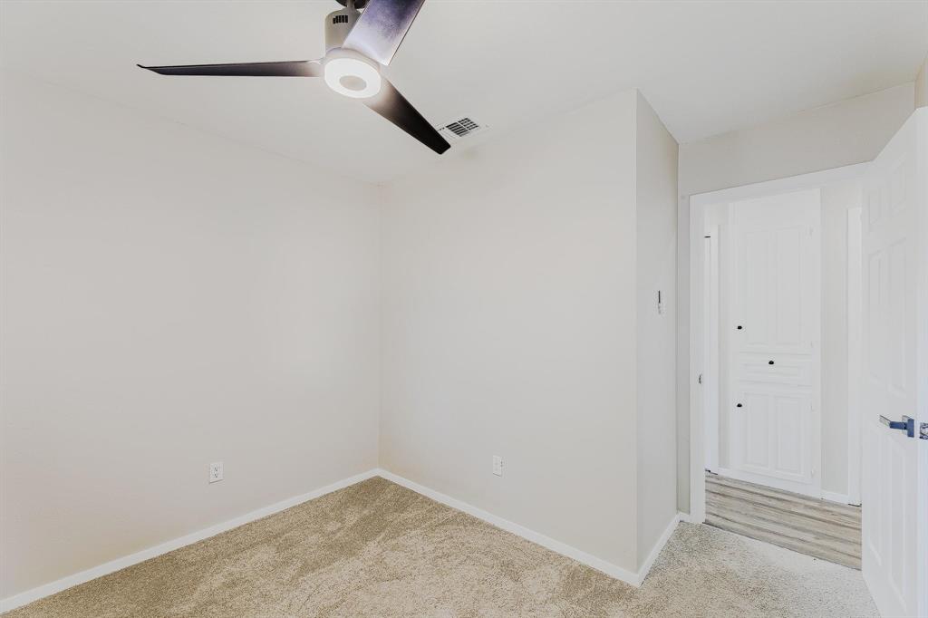 3305 Elm Grove Road Rowlett, TX 75098 - Photo 18 of 24 Empty room with carpet flooring and ceiling fan