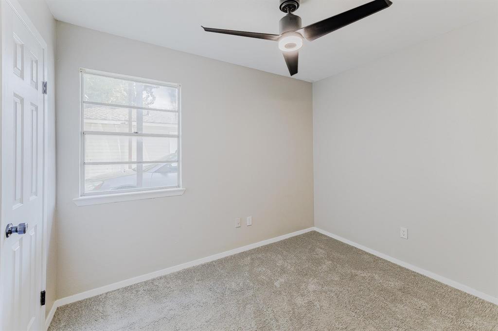 3305 Elm Grove Road Rowlett, TX 75098 - Photo 19 of 24 Carpeted empty room with baseboards and ceiling fan