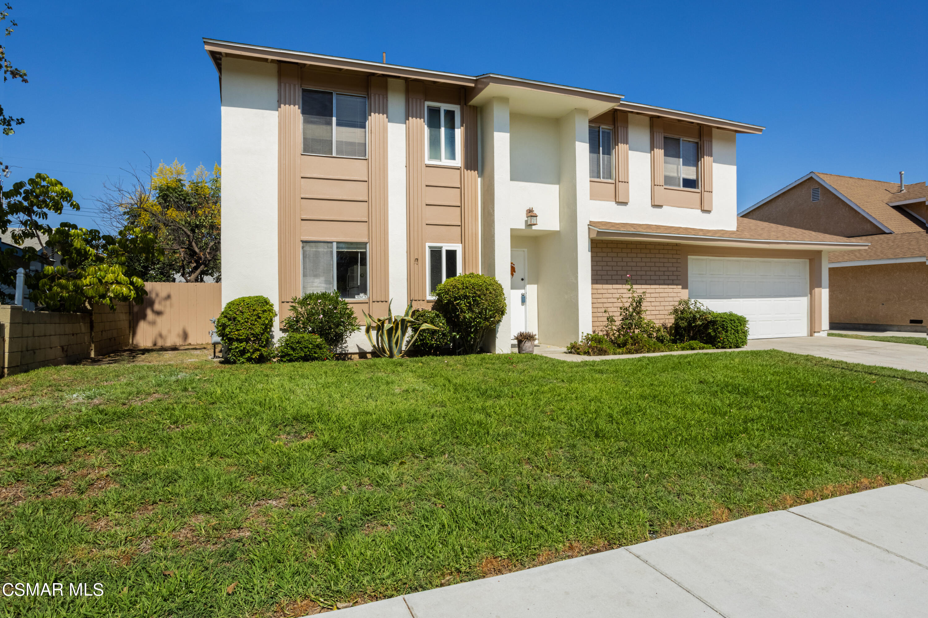 2291 Lysander Avenue Simi Valley, CA 93065 - Photo 1 of 25 a front view of a house with a garden