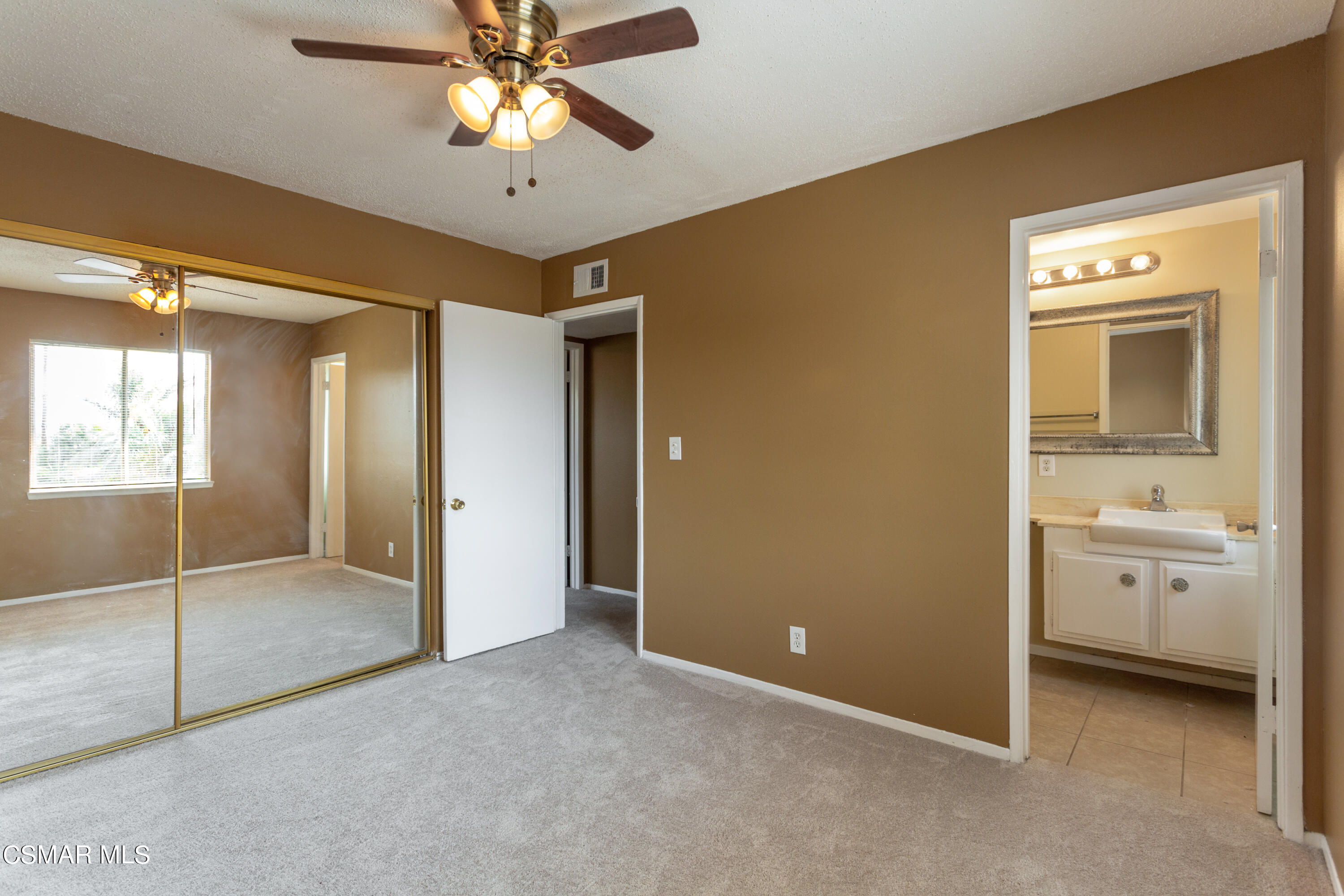 2291 Lysander Avenue Simi Valley, CA 93065 - Photo 14 of 25 a view of a bathroom with a shower and a sink