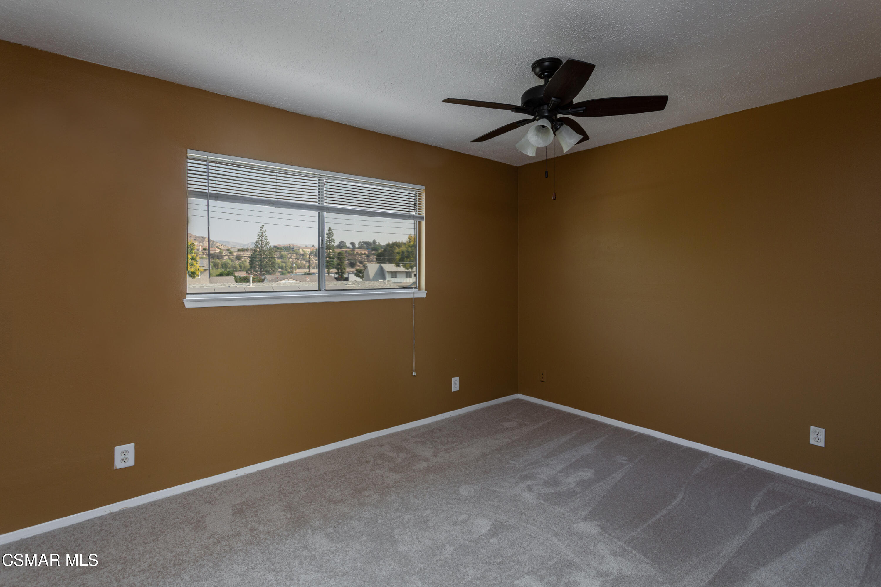 2291 Lysander Avenue Simi Valley, CA 93065 - Photo 17 of 25 a view of room with window and ceiling fan