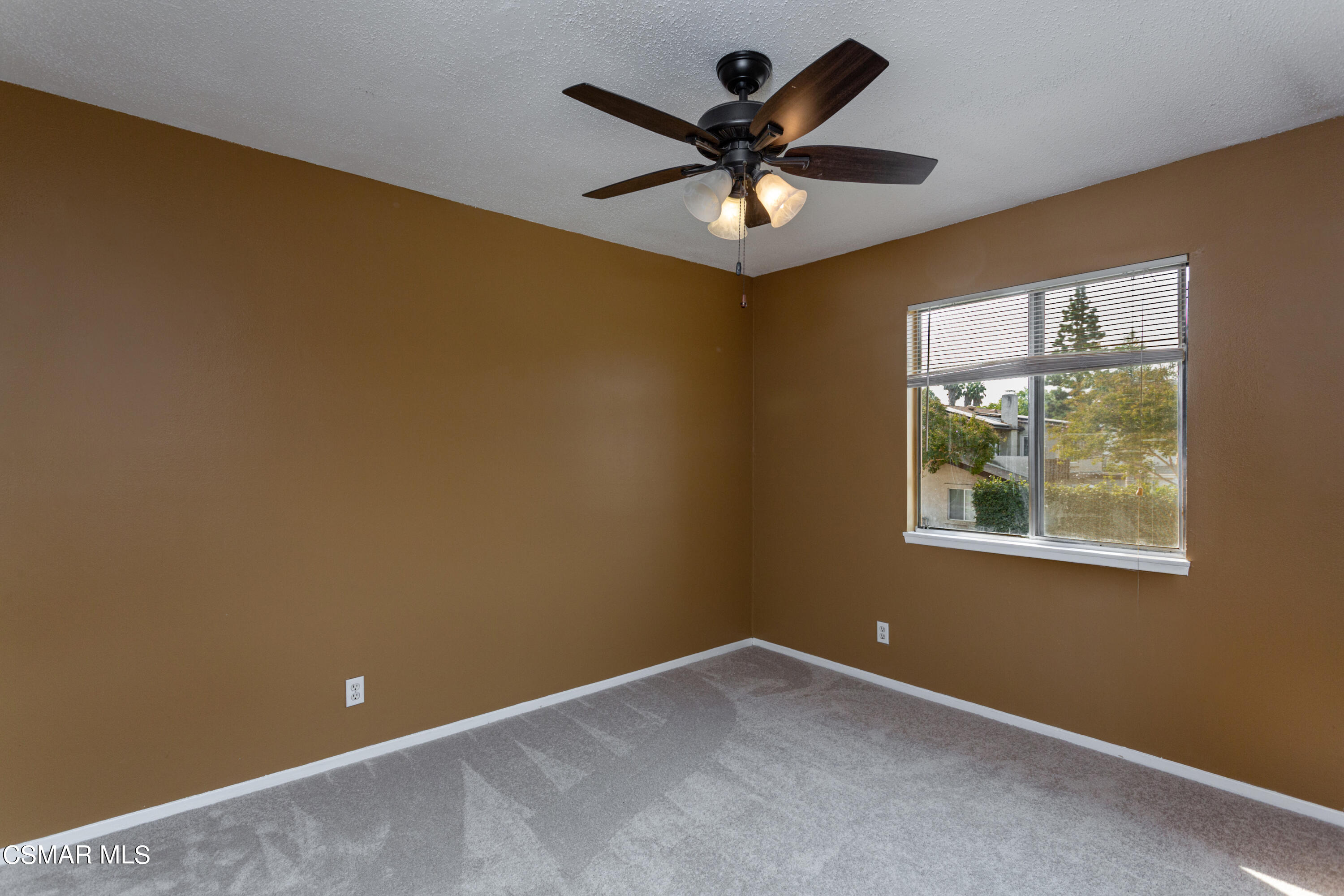 2291 Lysander Avenue Simi Valley, CA 93065 - Photo 19 of 25 an empty room with a window and a fan