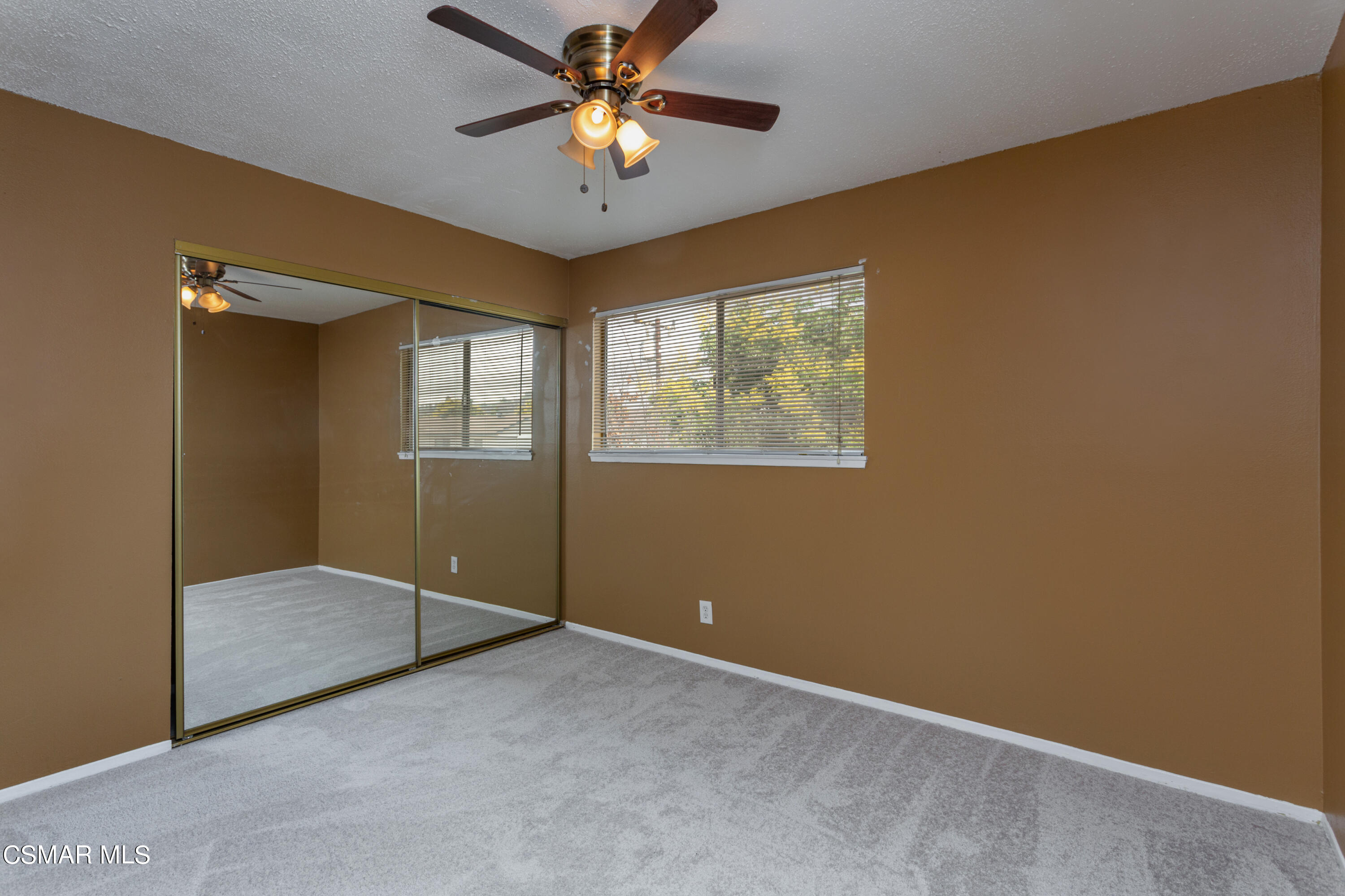 2291 Lysander Avenue Simi Valley, CA 93065 - Photo 20 of 25 an empty room with windows and fan