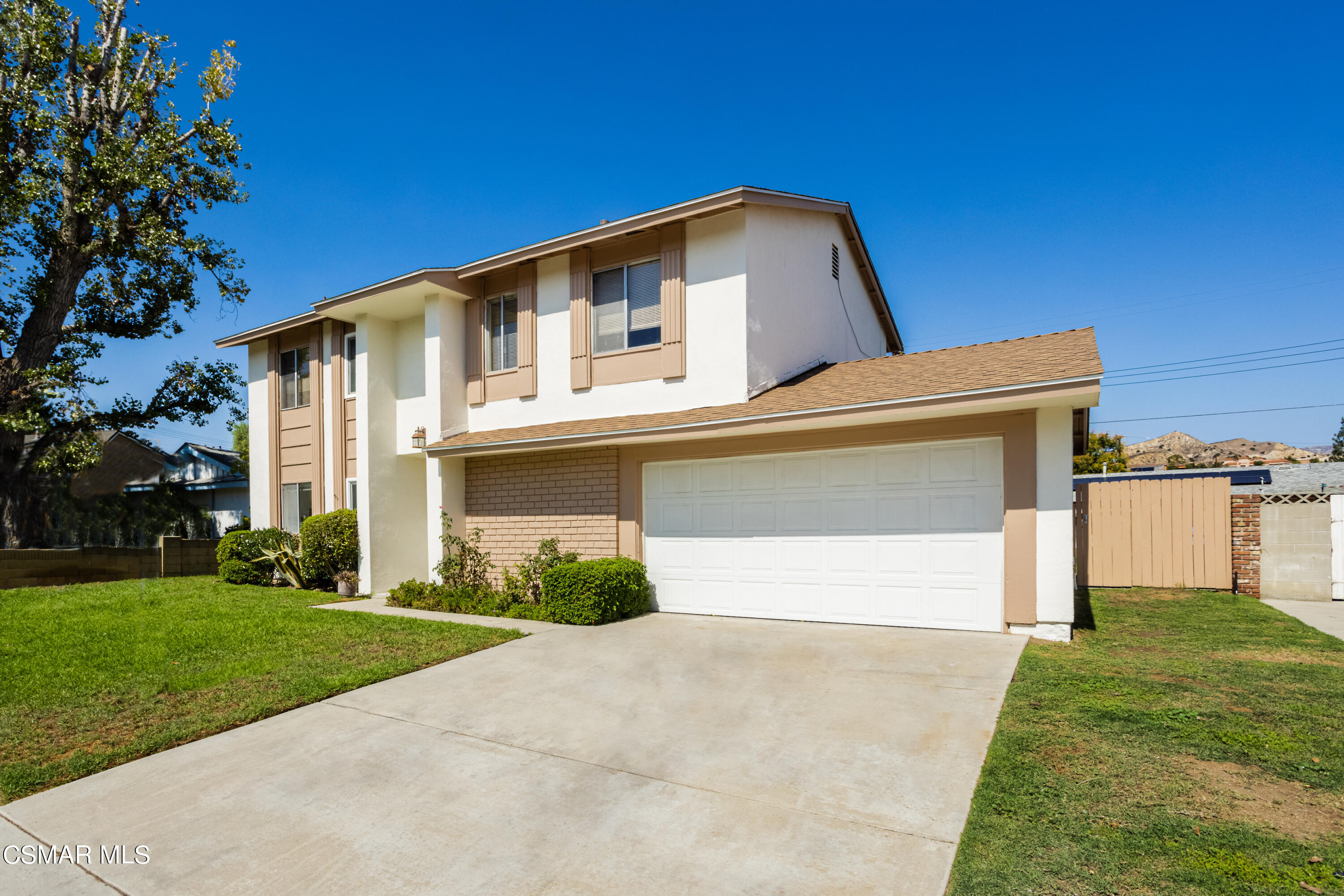2291 Lysander Avenue Simi Valley, CA 93065 - Photo 2 of 25 a front view of a house with a yard