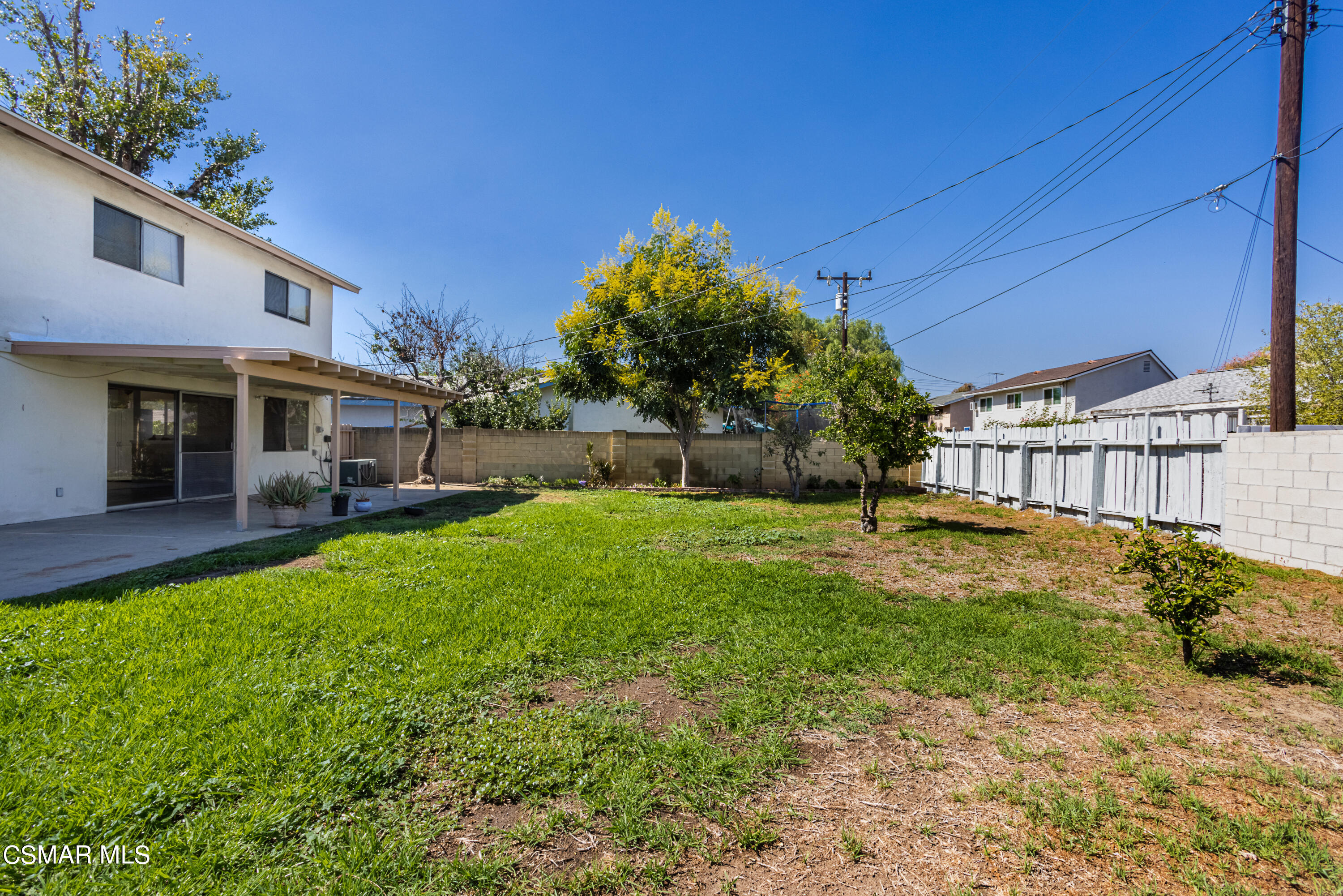 2291 Lysander Avenue Simi Valley, CA 93065 - Photo 22 of 25 a backyard of a house with table and chairs