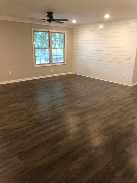309 Butler Road Portland, TN 37148 - Photo 11 of 30 an empty room with wooden floor and windows