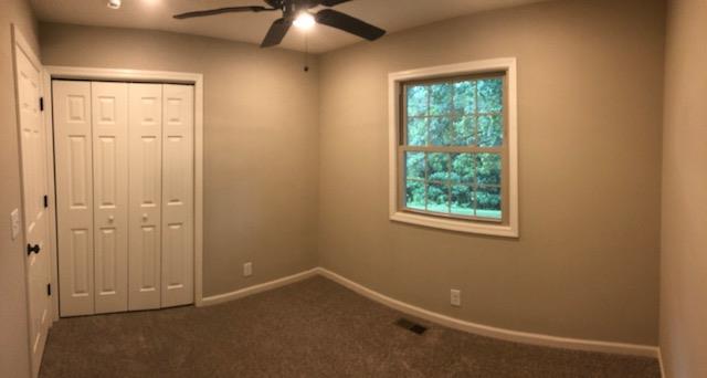 309 Butler Road Portland, TN 37148 - Photo 22 of 30 an empty room with windows and closet